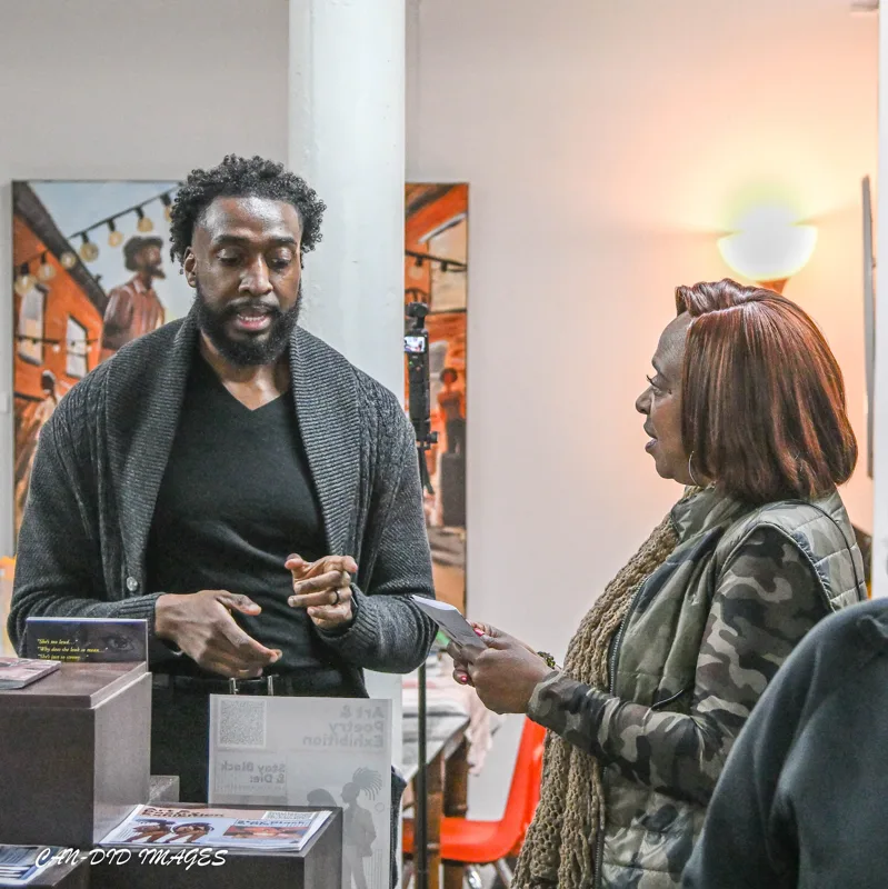Conversation beside the artwork.