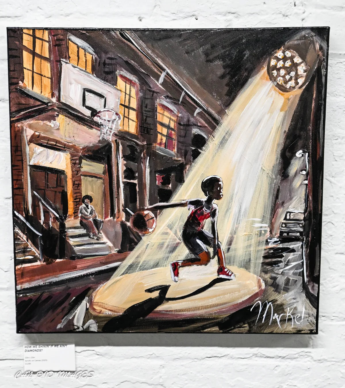 A painting of a young basketball player standing in a beam of light on a city street.